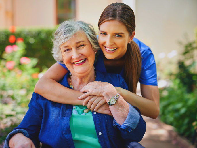 woman and senior smilling