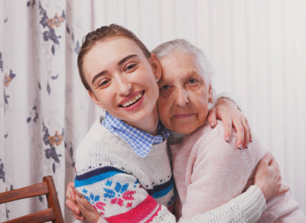 woman hugging the senior