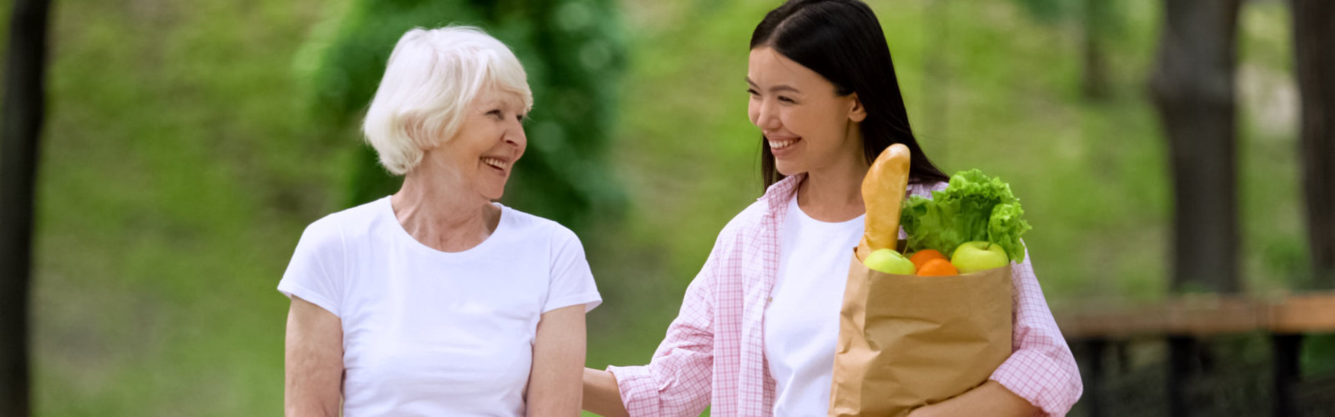 woman and senior smilling